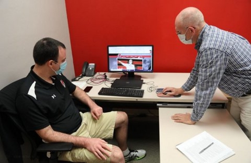 ASD Trevor Wenners and SD John Hughes check out the new website.