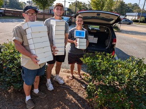 Students load up donations for people in need