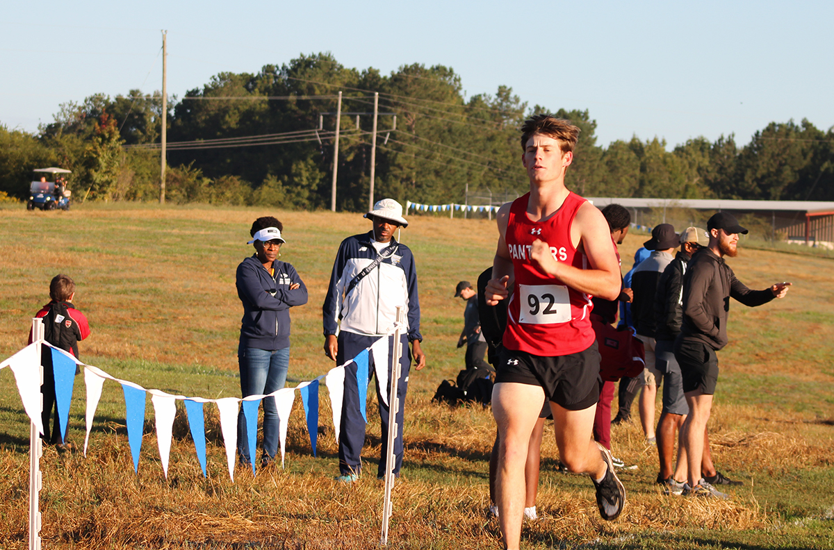 Student running in race