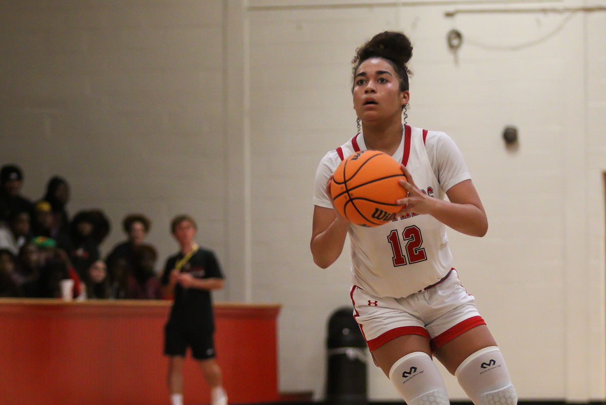 Student making a shot in the basket