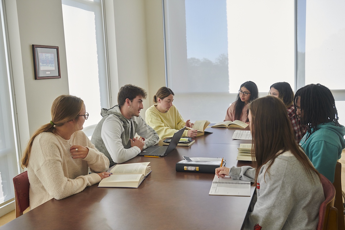 Students attending a meeting